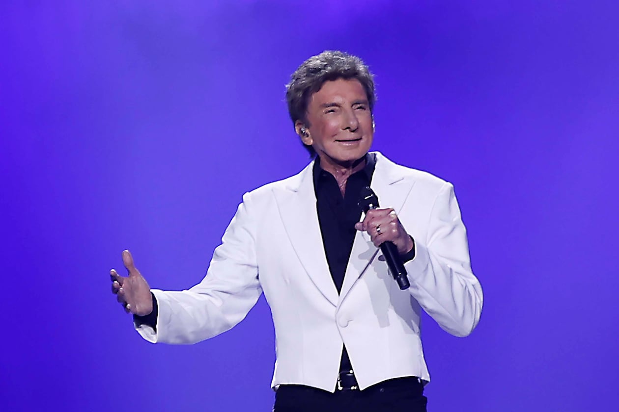 Barry Manilow kicks off his performance with timeless pop hits “It’s a Miracle,” “I’m Your Man” and “Somewhere in the Night” on Tuesday, Aug. 11, 2026, at Gas South Arena in Duluth. (Akili-Casundria Ramsess for the AJC)