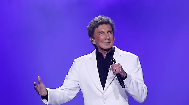 Barry Manilow kicks off his performance with timeless pop hits “It’s a Miracle,” “I’m Your Man” and “Somewhere in the Night” on Tuesday, Aug. 11, 2026, at Gas South Arena in Duluth. (Akili-Casundria Ramsess for the AJC)