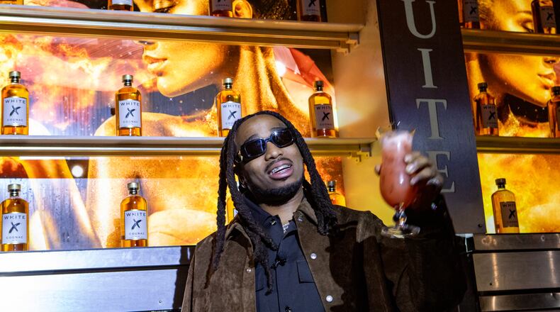 Rapper Quavo partners with White X cognac and attends a tasting at Suite Lounge on Wednesday, January 24, 2024. (Jenni Girtman for The Atlanta Journal-Constitution)