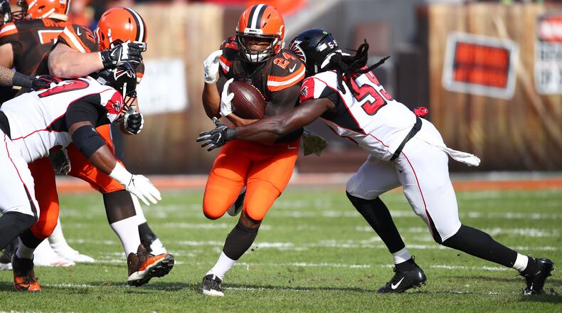 CLEVELAND, OH - NOVEMBER 11: Nick Chubb #24 of the Cleveland Browns runs the ball defended by De'Vondre Campbell #59 of the Atlanta Falcons in the first quarter at FirstEnergy Stadium on November 11, 2018 in Cleveland, Ohio. (Photo by Gregory Shamus/Getty Images)