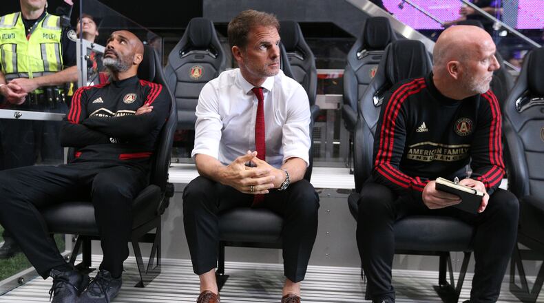 May 12, 2019 Atlanta: Atlanta United head coach Frank de Boer (center) and assistant coaches take the bench for the game against Orlando City in a MLS soccer match on Sunday, May 12, 2019, in Atlanta. Curtis Compton/ccompton@ajc.com