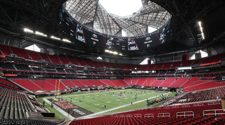 Mercedes-Benz Stadium is empty of fans but the Atlanta Falcons open the roof as they prepare to play the Seattle Seahawks on Sunday, Sept. 13, 2020, in Atlanta. (Curtis Compton/AJC file)