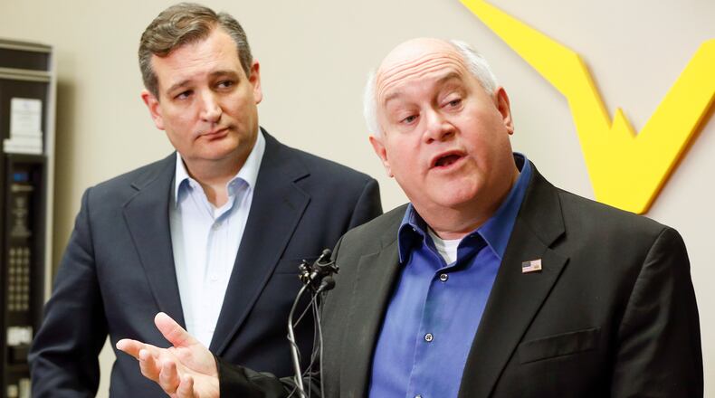 Kansas Fourth District congressional candidate Ron Estes, right, and U.S. Sen. Ted Cruz who came to Wichita to campaign for Estes the day before a special election on Monday. Fernando Salazar/The Wichita Eagle via AP