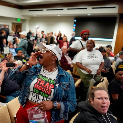 People protest in a Senate committee meeting during a special session of the state legislature to redraw U.S. Congressional voting maps Wednesday, May 6, 2026, in Nashville, Tenn. (AP Photo/George Walker IV)