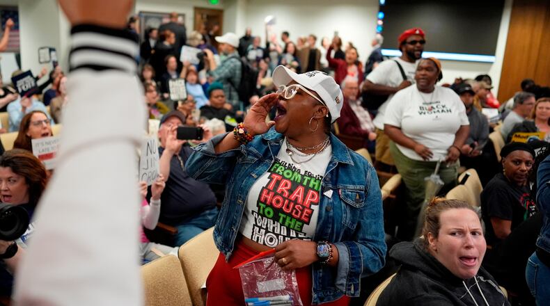 People protest in a Senate committee meeting during a special session of the state legislature to redraw U.S. Congressional voting maps Wednesday, May 6, 2026, in Nashville, Tenn. (AP Photo/George Walker IV)