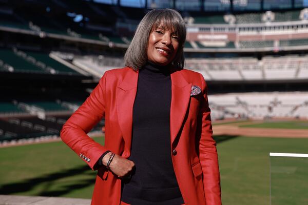DeRetta Rhodes, executive vice president and chief people & culture officer of the Atlanta Braves, poses for a portrait at Truist Park. (Natrice Miller/AJC)