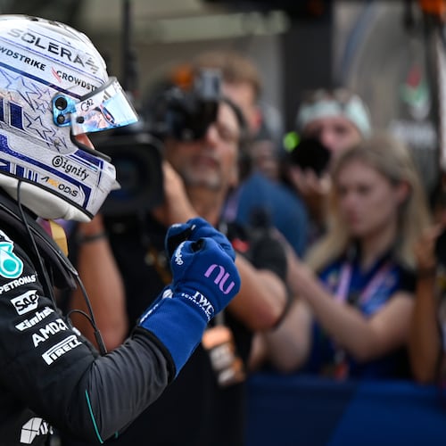 Mercedes driver Andrea Kimi Antonelli of Italy celebrates after setting the pole position during the qualifying session for the Monaco F1 Grand Prix, at the Monaco racetrack, Saturday, June 6, 2026. (AP Photo/Philippe Magoni)