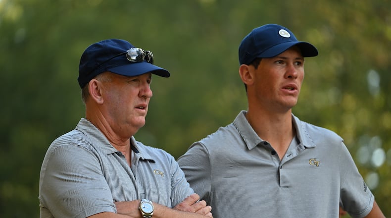 Georgia Tech golf coach Bruce Heppler (left) confers with team member Christo Lamprecht at the Golf Club of Georgia Collegiate tournament at Golf Club of Georgia in Alpharetta Oct. 22, 2022. (Danny Karnik/Georgia Tech Athletics)