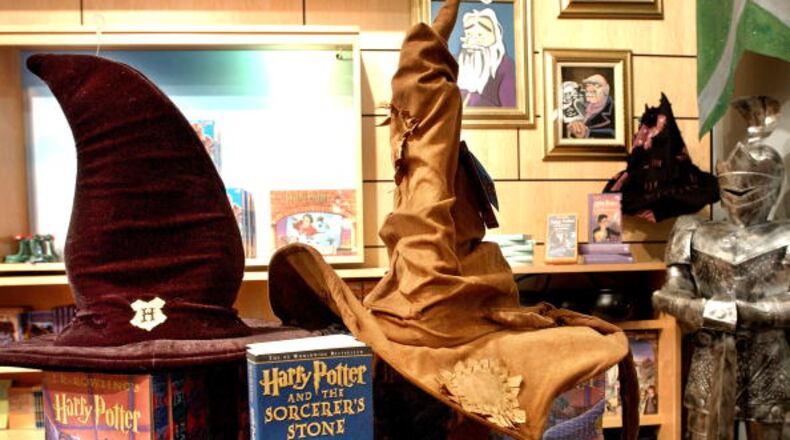 NEW YORK - JUNE 17: Hogwarts Wizard School Sorting hats rest on a display of already released books from the Potter series at the Scholastic store June 17, 2003 in New York, NY. Author J.K. Rowling's highly anticipated latest edition of the Potter series "Harry Potter and the Order of the Phoenix" will be released globally at midnight on June 21. (Photo by Stephen Chernin/Getty Images)