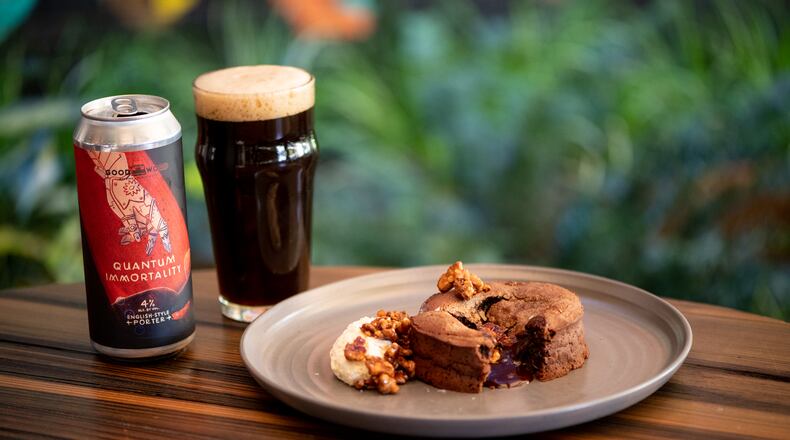 Good Word Quantum Immortality English-Style Porter is perfectly paired with chocolate lava cake with espresso whipped cream and candied walnuts. (Mia Yakel for The Atlanta Journal-Constitution)