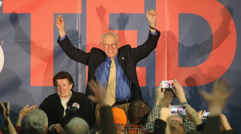 Rafael Cruz and Eleanor Darragh celebrate a win by their son, Republican presidential candidate Ted Cruz of Texas in the Iowa caucuses on Monday. Christopher Furlong/Getty Images