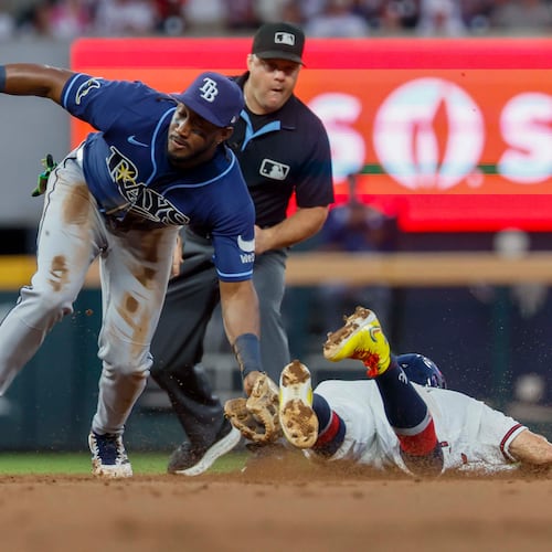 Atlanta Braves left fielder Mauricio Dubón is tagged out by Tampa Bay Rays shortstop Jorge Mateo in the first inning at Truist Park on Wednesday, Sep. 9, 2026, in Atlanta. (Miguel Martinez/ AJC)