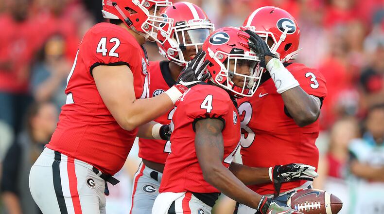 Georgia special teams players celebrate with Mecole Hardman after he downed South Carolina inside the five yard line on a punt during the second half of a NCAA college football game on Saturday, November 4, 2017, in Athens. Curtis Compton/ccompton@ajc.com