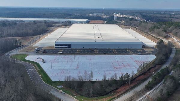 An aerial photo shows a large warehouse near downtown Social Circle, Ga., on Monday, Jan. 6, 2026. The Trump administration had considered converting the warehouse into a massive immigration detention facility. (Miguel Martinez/ AJC)