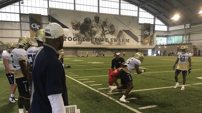 Georgia Tech quality control specialist and former Yellow Jackets star Will Glover watches a wide receiver PeJé Harris during wide-receiver drill during practice August 2, 2019. (AJC photo by Ken  Sugiura)