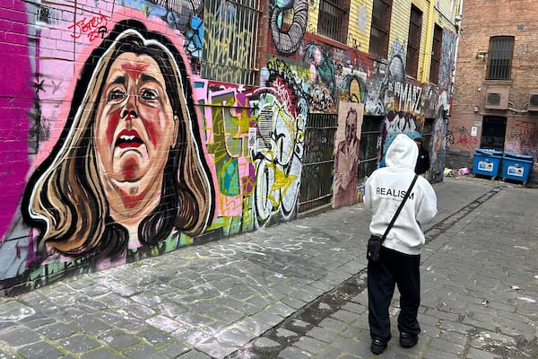 A likeness of Erin Patterson is painted on a wall in Melbourne, Australia, on June 28, 2025. (AP Photo/Rod McGuirk)