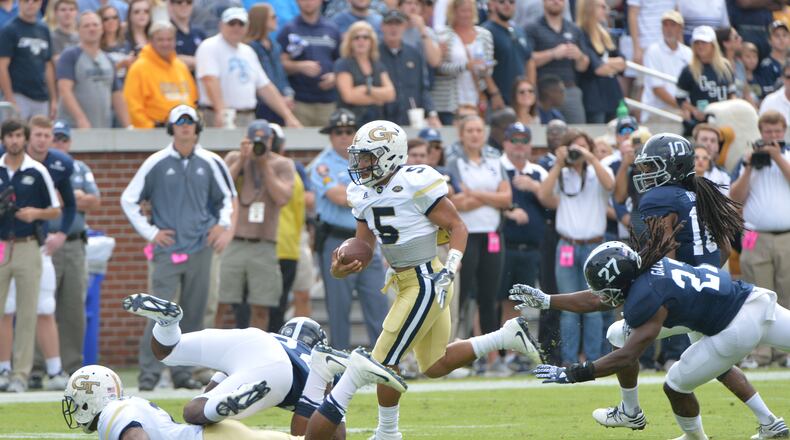 Georgia Tech quarterback Justin Thomas (5) runs for a touchdown in the first half at Bobby Dodd Stadium on Saturday, October 15, 2016. HYOSUB SHIN / HSHIN@AJC.COM