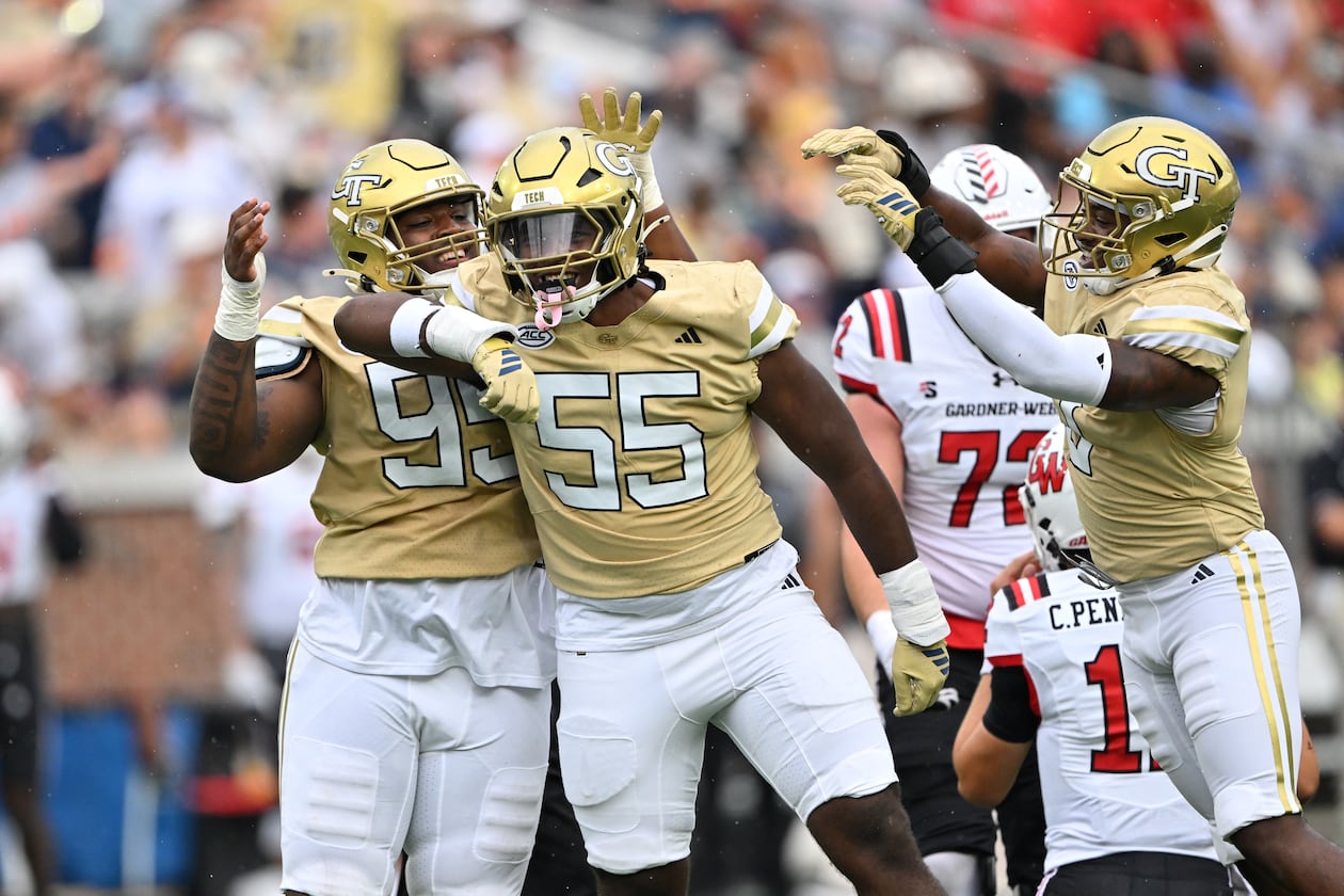 Georgia Tech defensive linemen Christian Garrett (55) and Jason Moore (95) react during the first half of an NCAA college football game at Georgia Tech's Bobby Dodd Stadium, Saturday, November 6, 2025 in Atlanta. (Hyosub Shin/AJC)