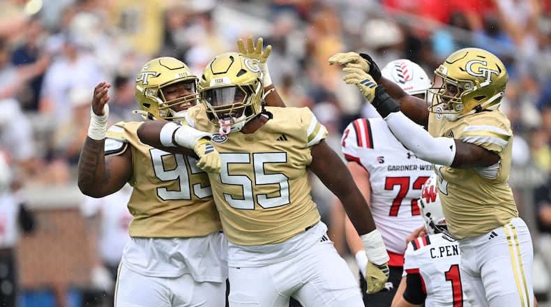 Georgia Tech defensive linemen Christian Garrett (55) and Jason Moore (95) react during the first half of an NCAA college football game at Georgia Tech's Bobby Dodd Stadium, Saturday, November 6, 2025 in Atlanta. (Hyosub Shin/AJC)