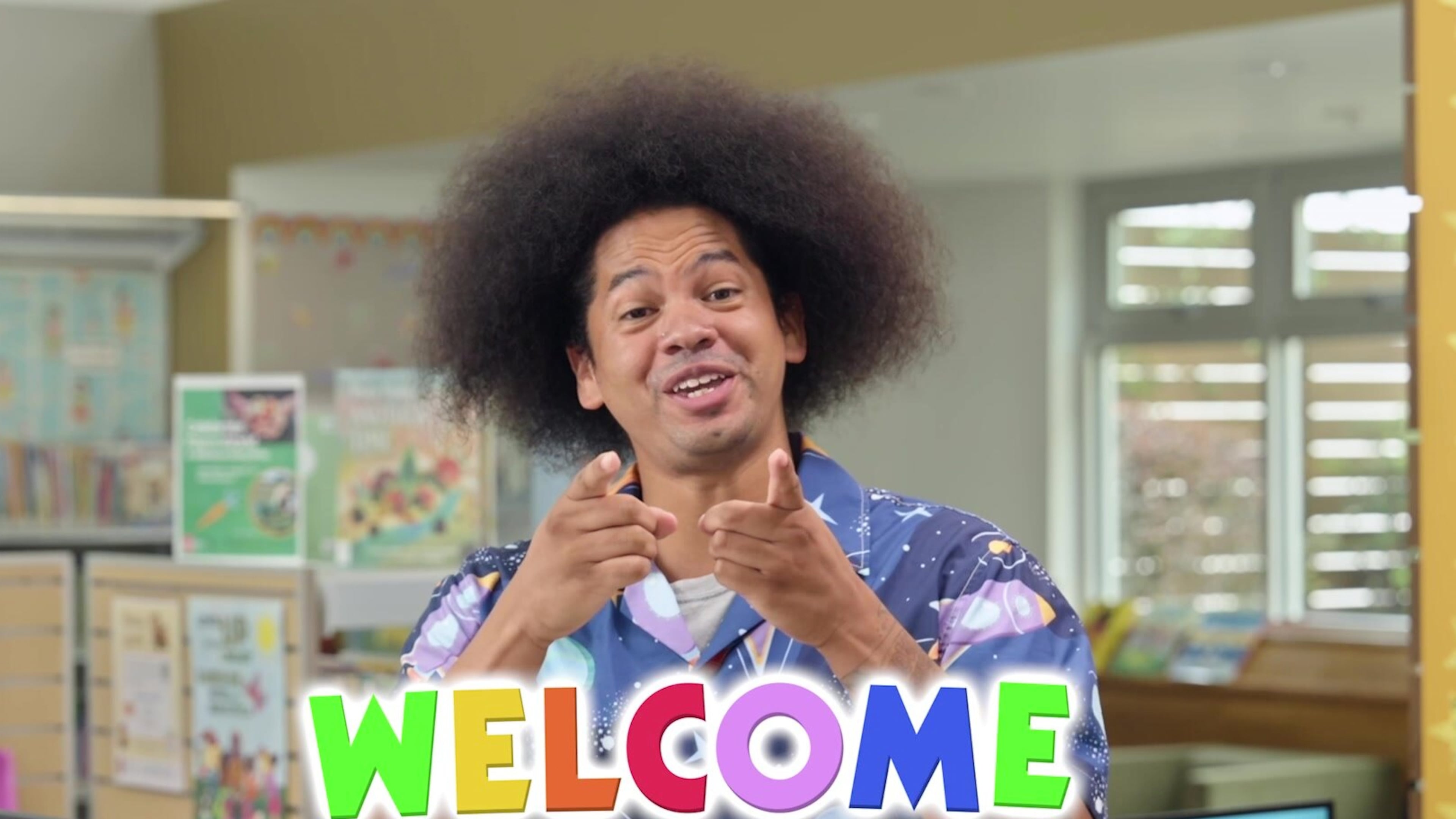 This image released by Embassy Row shows literacy advocate Mychal Threets, host of the children’s series “Reading Rainbow” on the KidZuko YouTube channel. (Embassy Row via AP)