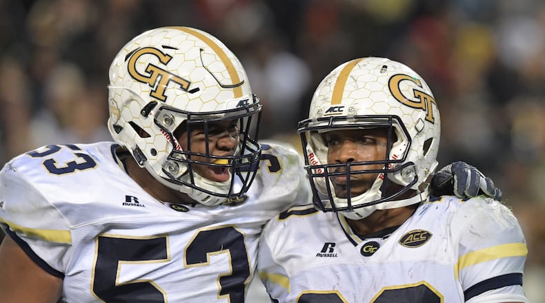 October 21, 2017 Atlanta - Georgia Tech running back KirVonte Benson (30) celebrates with Jahaziel Lee (53) in the second half of an NCAA college football game at Bobby Dodd Stadium on Saturday, October 21, 2017. Georgia Tech beat Wake Forest 38-24. HYOSUB SHIN / HSHIN@AJC.COM