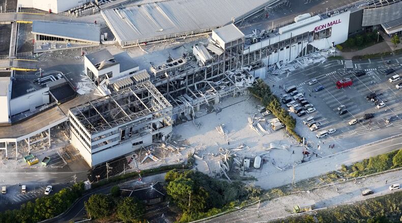 This aerial image shows the damaged AEON Mall following an earthquake in Kashima, Kumamoto prefecture, southern Japan, Tuesday, July 28, 2026. (Kyodo News via AP)