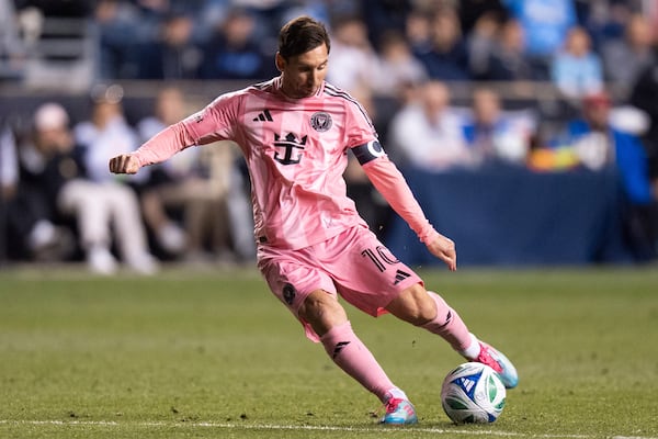 FILE - Inter Miami's Lionel Messi kicks the free kick for a goal during an MLS soccer match against the Philadelphia Union, Saturday, May 24, 2025, in Chester, Pa.. (AP Photo/Chris Szagola, File)