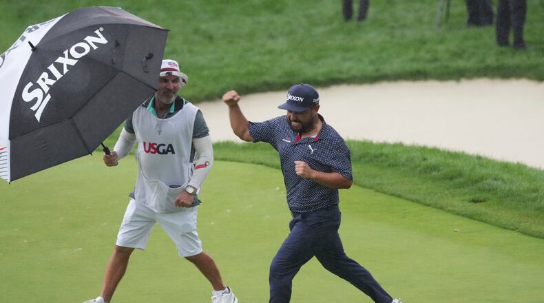 FILE - J.J. Spaun celebrates making a birdie putt on the 18th hole during the final round of the U.S. Open golf tournament at Oakmont Country Club Sunday, June 15, 2025, in Oakmont, Pa. (AP Photo/Gene J. Puskar, file)