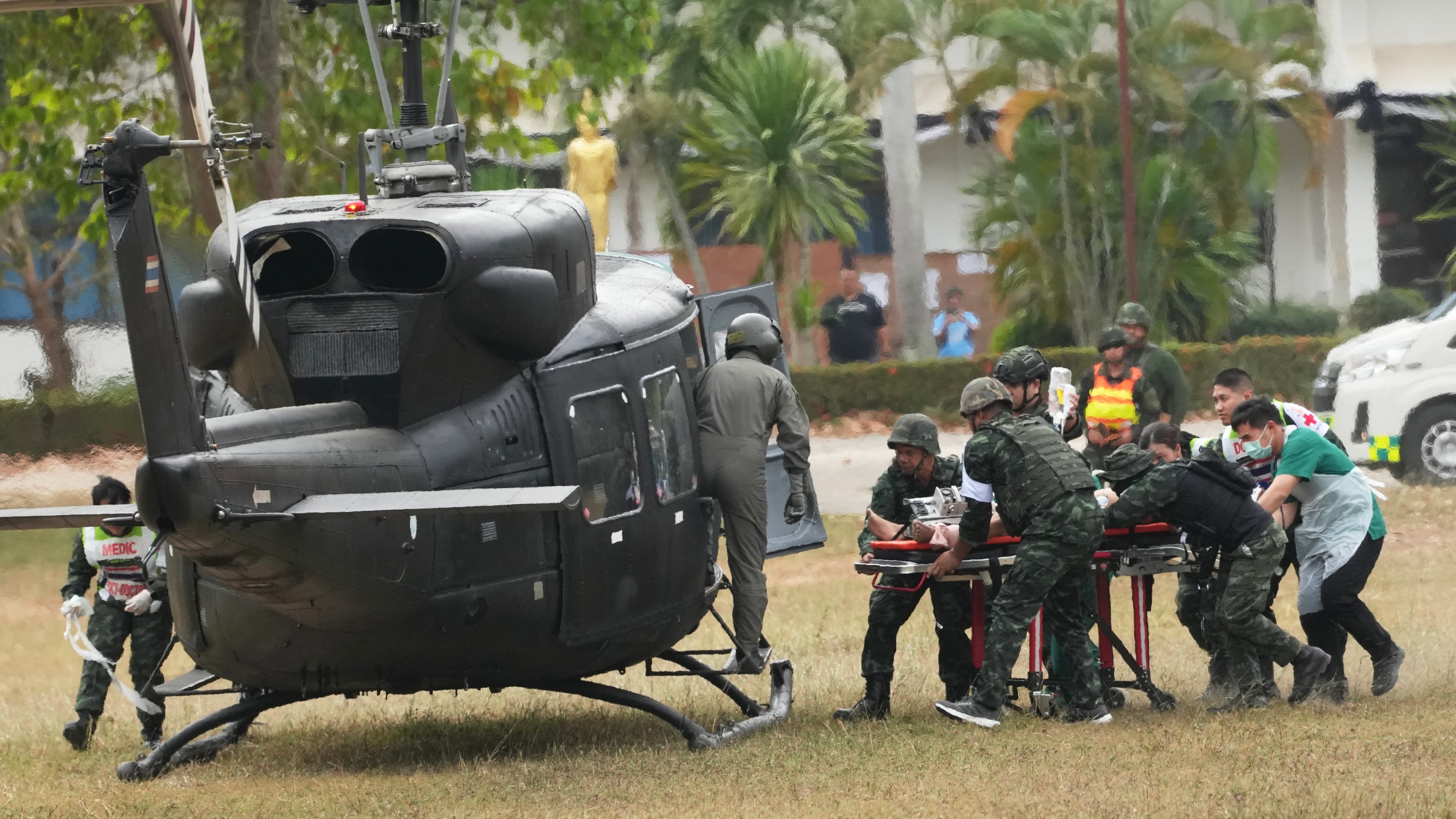 An wounded Thai soldier is carried to be transferred to a hospital, in Surin province, Thailand, Wednesday, Dec. 10, 2025, following clashes between Thai and Cambodian soldiers. (AP Photo/Sakchai Lalit)