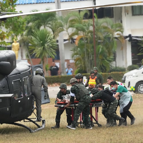 An wounded Thai soldier is carried to be transferred to a hospital, in Surin province, Thailand, Wednesday, Dec. 10, 2025, following clashes between Thai and Cambodian soldiers. (AP Photo/Sakchai Lalit)