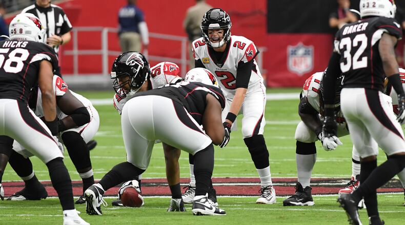 Falcons quarterback Matt Ryan calls out signals prior to taking the snap from under center during the first quarter Oct. 13, 2019, at State Farm Stadium in Glendale, Ariz.