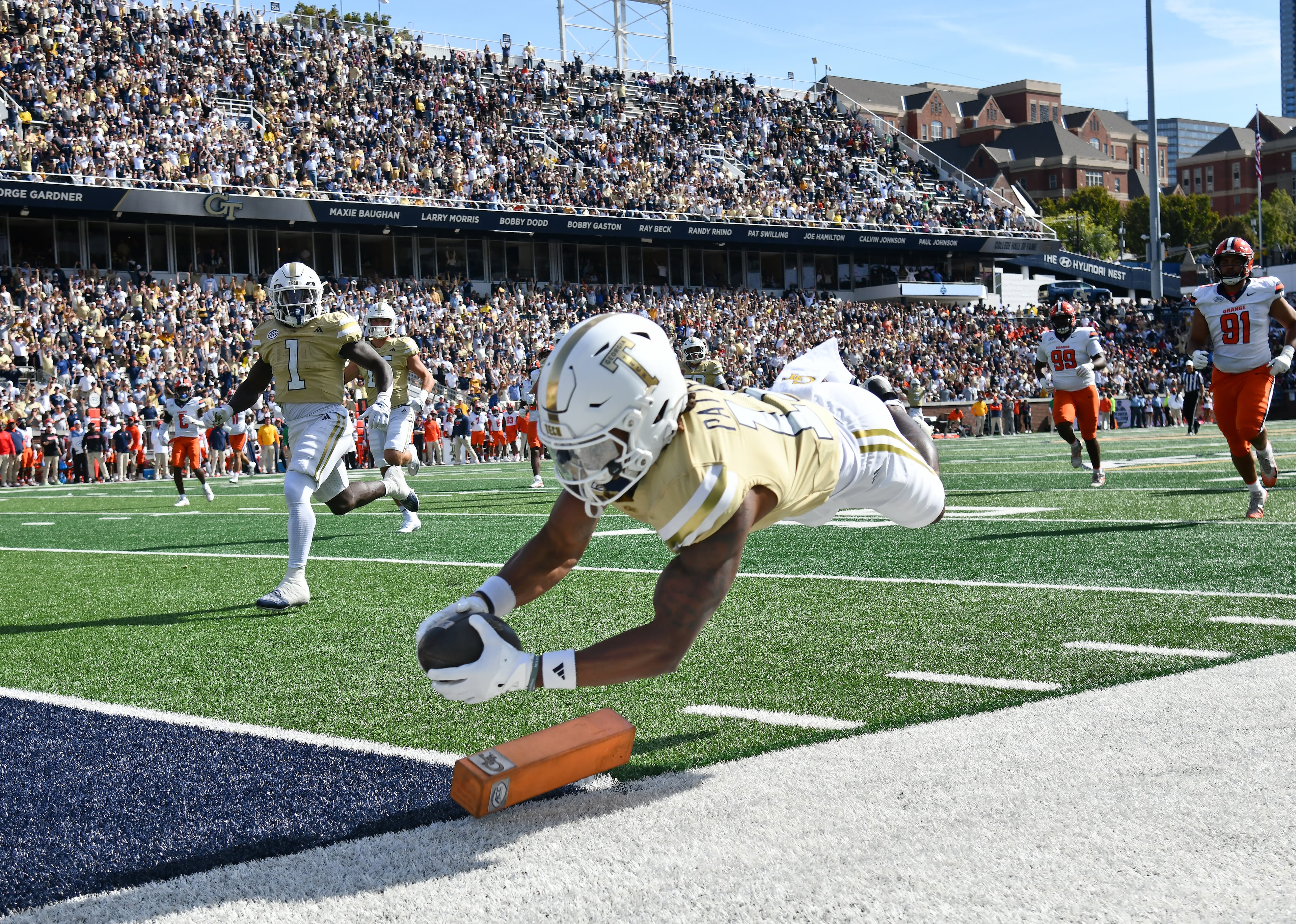 Georgia Tech wide receiver Dean Patterson dives into the end zone for a touchdown during the second half in an NCAA college football game at Bobby Dodd Stadium, Saturday, Oct. 25, 2025 in Atlanta. Georgia Tech won 41-16 over Syracuse. The Yellow Jackets are 8-0 for the first time since 1966 and 5-0 in the ACC for the first time ever. (Hyosub Shin/AJC)
