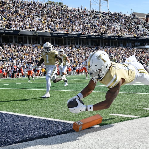 Georgia Tech wide receiver Dean Patterson dives into the end zone for a 37-yard touchdown reception off a screen pass Saturday, Oct. 25, 2025, against Syracuse in Atlanta. Patterson has just six catches this season, but two have been TDs, and he's a standout on special teams. (Hyosub Shin/AJC)