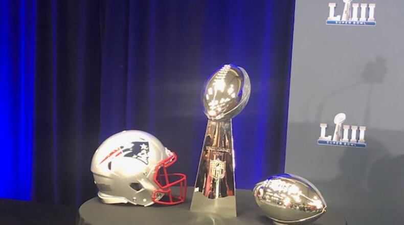 Here's the Patriots' Vince Lombardi Trophy from Super Bowl LIII and wide receiver Julian Edelman's Super Bowl MVP Trophy on display at the Georgia World Congress Center on Monday, Feb. 4, 2019. (By D. Orlando Ledbetter/dledbetter@ajc.com)