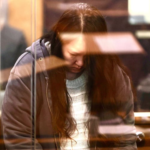 FILE - Hakyung Lee stands in the dock at the High Court in Auckland, New Zealand, on Sept. 8, 2025. (Lawrence Smith/Stuff Pool Photo via AP, File)