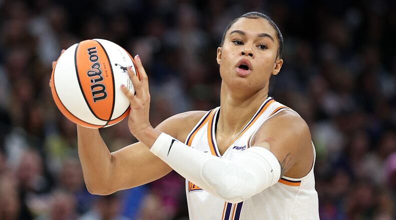 FILE - Phoenix Mercury forward Satou Sabally (0) looks to pass against the Minnesota Lynx during the first half of Game 2 of a WNBA basketball playoff semifinals series Tuesday, Sept. 23, 2025, in Minneapolis. (AP Photo/Matt Krohn, File)
