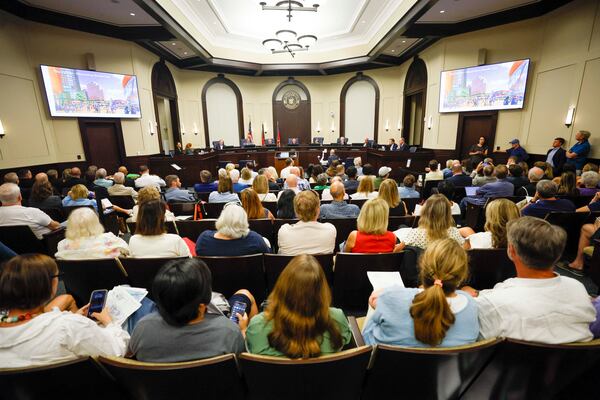 Attendees packed the Alpharetta City Hall Council Chamber on Monday, August 24, 2026, for a public hearing at which the City Council is considering a master plan amendment, rezoning, conditional use, and variances to allow the redevelopment of North Point Mall as a mixed-use development in hopes of securing an NHL franchise.  (Miguel Martinez/AJC)