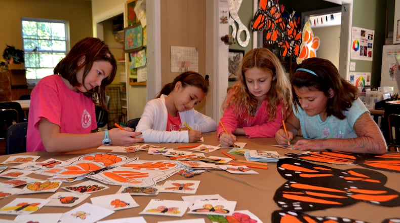 Students at Atlanta's Springmont Montessori create artistic butterflies for the school’s Monarchs to Mexico art and science project. Springmont was founded in 1963 as Atlanta’s first Montessori school.