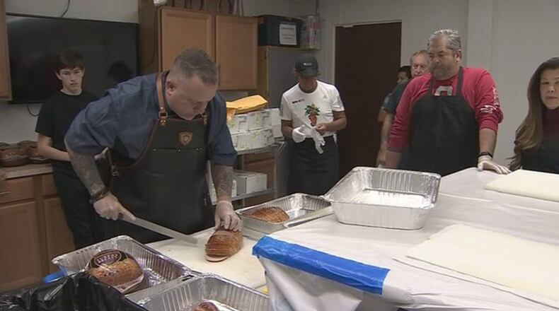 Florida businessman Eric Holm is providing free Thanksgiving meals to more than 15,000 people at the Salvation Army on Thursday.