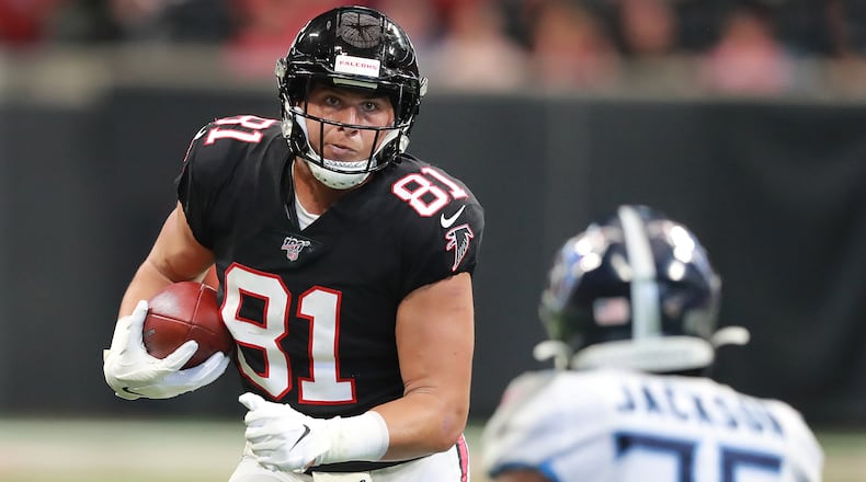 Falcons tight end Austin Hooper runs for a first down against the Tennessee Titans in a NFL football game on Sunday, Sept. 29, 2019, in Atlanta. Curtis Compton/ccompton@ajc.com