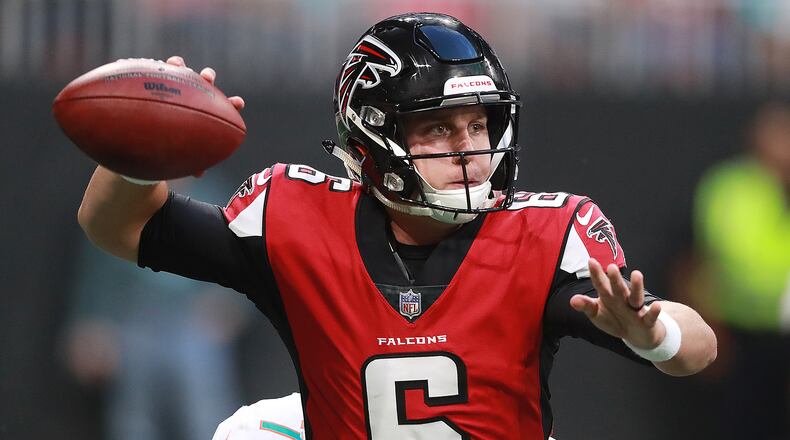 Atlanta Falcons quarterback Kurt Benkert looks to pass under pressure from Miami Dolphins defensive end Cameron Malveaux during the first quarter in a NFL preseason game on Thursday, August 30, 2018, in Atlanta. Curtis Compton/ccompton@ajc.com