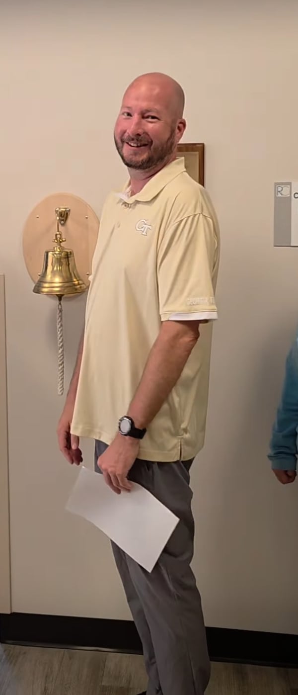 Ernie Strauss rings the bell, celebrating the end of his radiation treaments for prostate cancer just a couple weeks ago. He is devoting some of his free time to helping others work through the fear and questions about what they are facing with a prostate cancer diagnosis. (Courtesy Northside Hospital Atlanta)