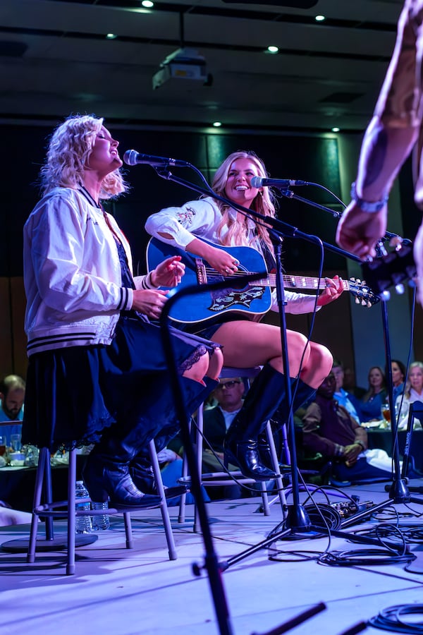 Sisters Kendra, left, and Krista Slaubaugh of Tigirlily Gold were among the country music stars to play at the 2025 In the Round concert. (AJ Henderson/Georgia Southern Athletics)