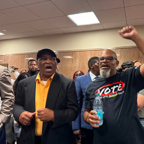 Protestors fill the halls in the Louisiana Legislature in Baton Rouge during a Senate committee hearing Friday, May 8, 2026 on redistricting. (AP Photo/Jack Brook)