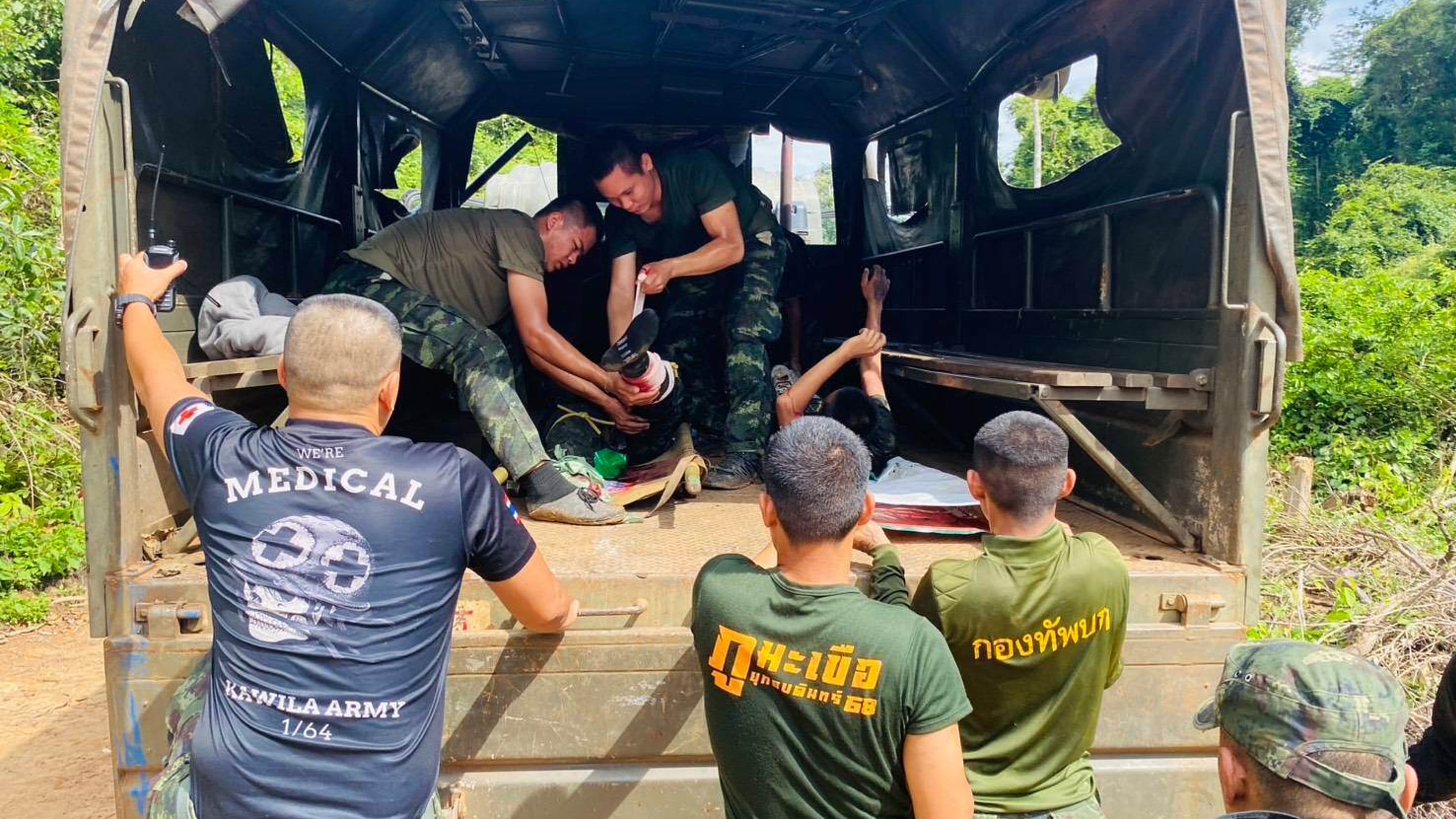In this photo released by Royal Thai Army, two Thai soldiers injured by a landmine during a patrol near the Thai-Cambodia border are treated as they are to be transferred to a hospital in Sisaket province, Thailand, Monday, Nov. 10, 2025. (Royal Thai Army via AP)