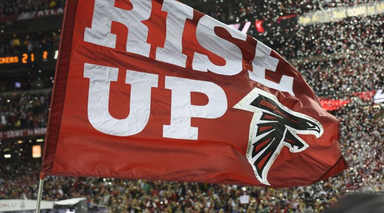 January 22, 2017, Atlanta - The Falcons flag is flown after the NFC Championship game against the Packers in Atlanta, Georgia, on Sunday, January 22, 2017. The Falcons defeated the Packers 44-21. (DAVID BARNES / DAVID.BARNES@AJC.COM)