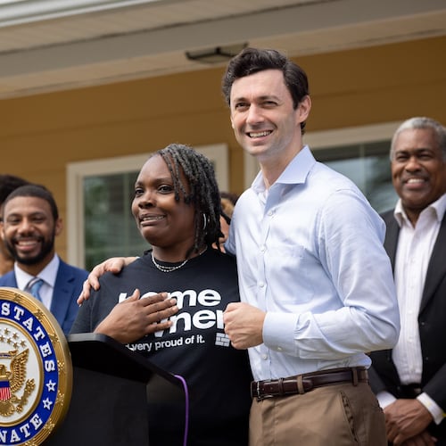 U.S. Sen. Jon Ossoff (right) stands with homeowner Tanjills Sawyer during a news conference announcing federal funds for housing in Clayton County. Georgia is facing a housing shortage of between 100,000 and 350,000 homes, writes Mesha Mainor. (Arvin Temkar/AJC 2024)
