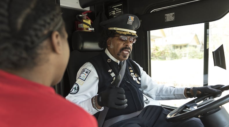 MARTA bus operator Coy Dumas Jr. greets every passenger on his bus route in a neighborhood west of Atlanta. (DAVID BARNES / DAVID.BARNES@AJC.COM)