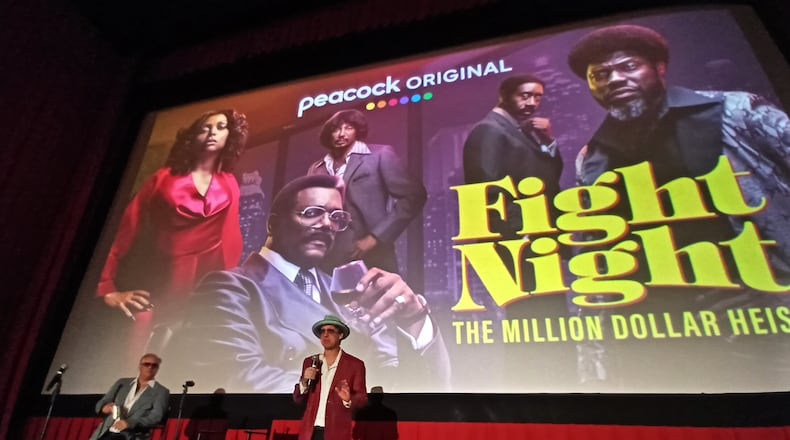 Jeff Keating (right) and his podcast co-writer Jim Roberts speak before the screening of "Fight Night: The Million Dollar Heist" at the Tara Theatre on Sept. 7." 
Credit: Blake Guthrie