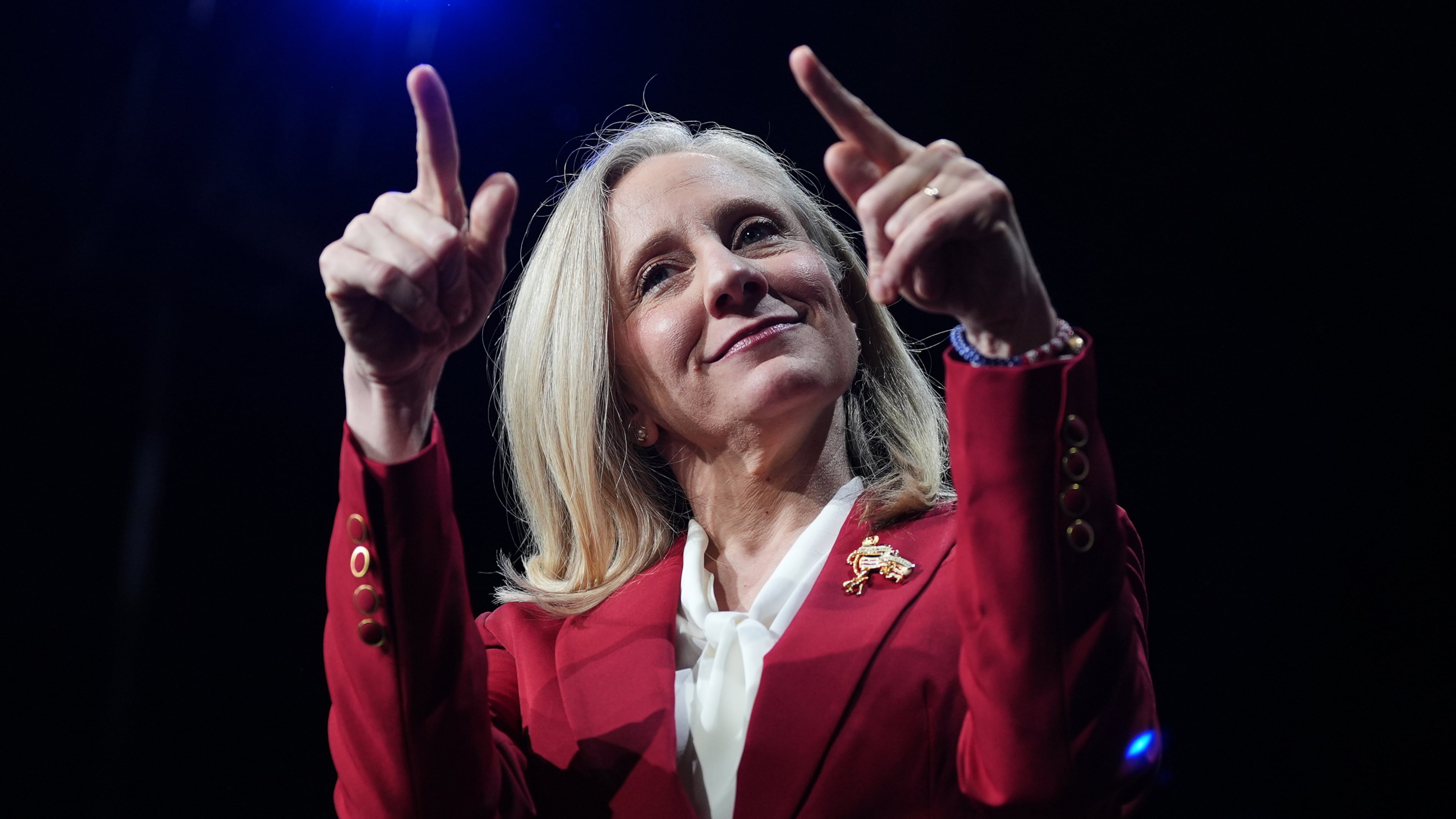 Democrat Abigail Spanberger points out at the crowd after she was declared the winner of the Virginia governor's race during an election night watch party Tuesday, Nov. 4, 2025, in Richmond, Va. (AP Photo/Stephanie Scarbrough)